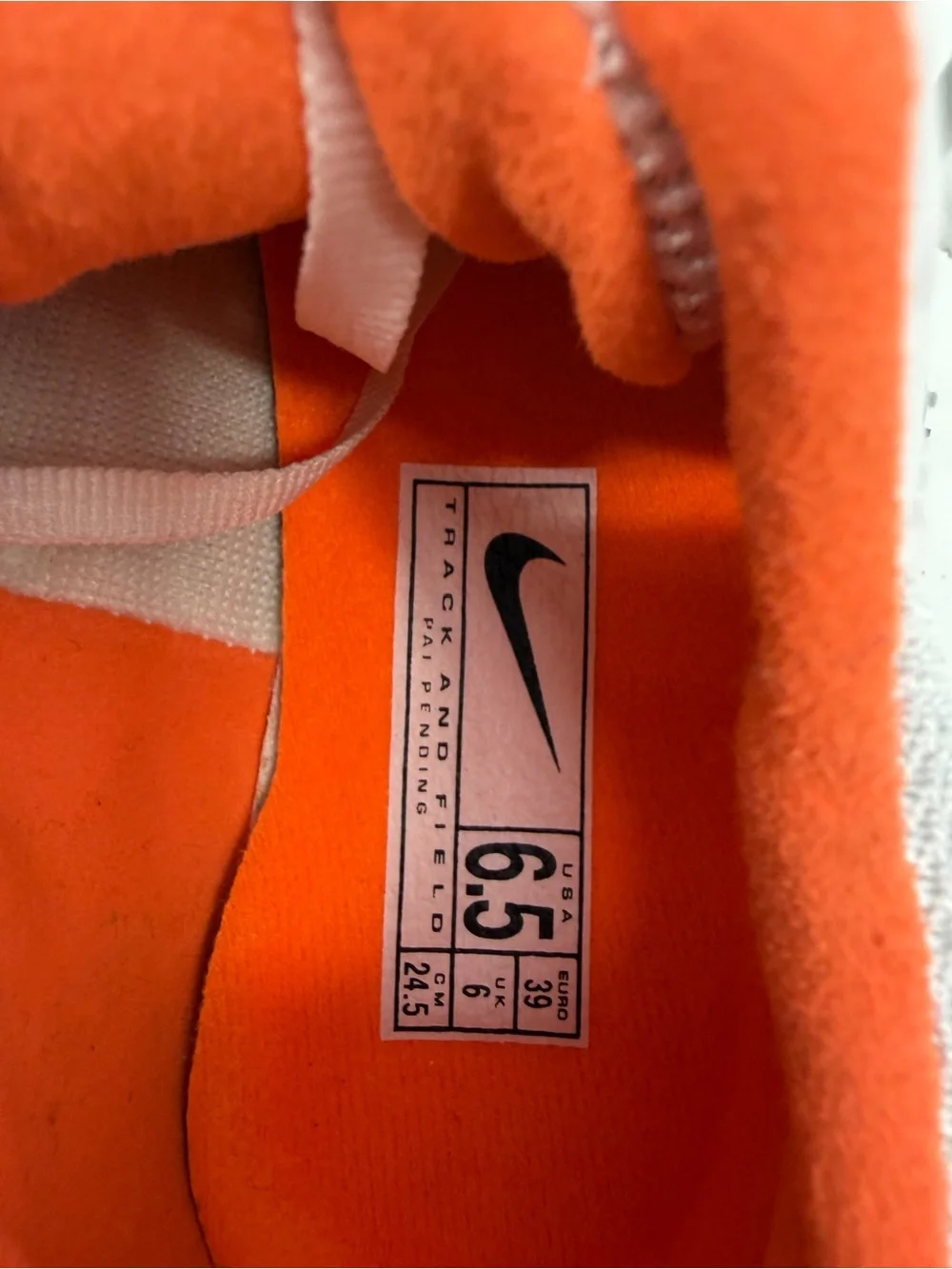 Nike Kids White & Gray Cleats with Orange Lining
